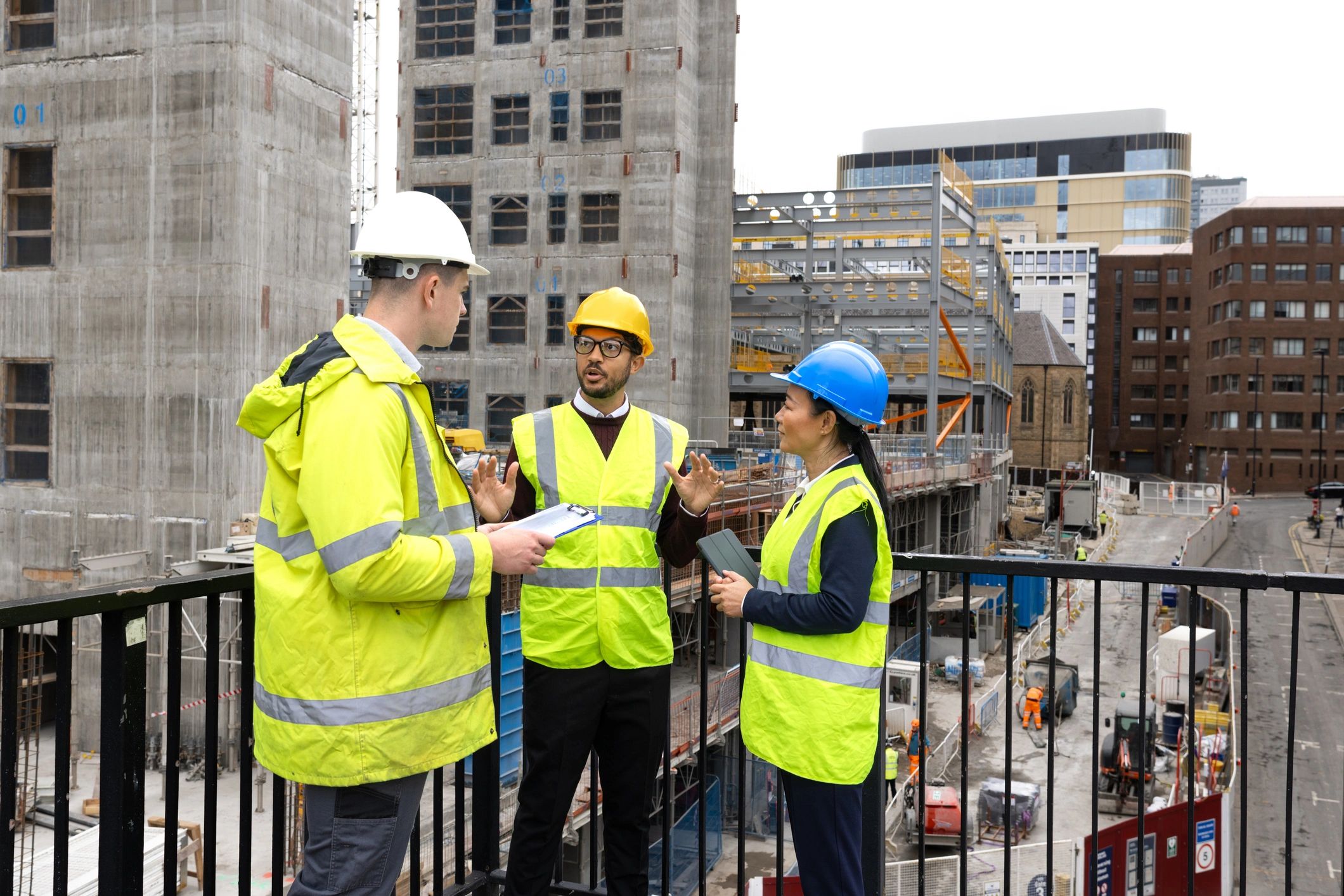 Construction team reviewing plans on site
