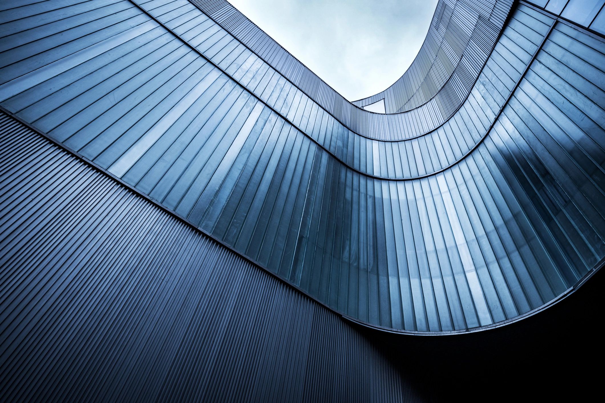 Contemporary curved glass facade architecture